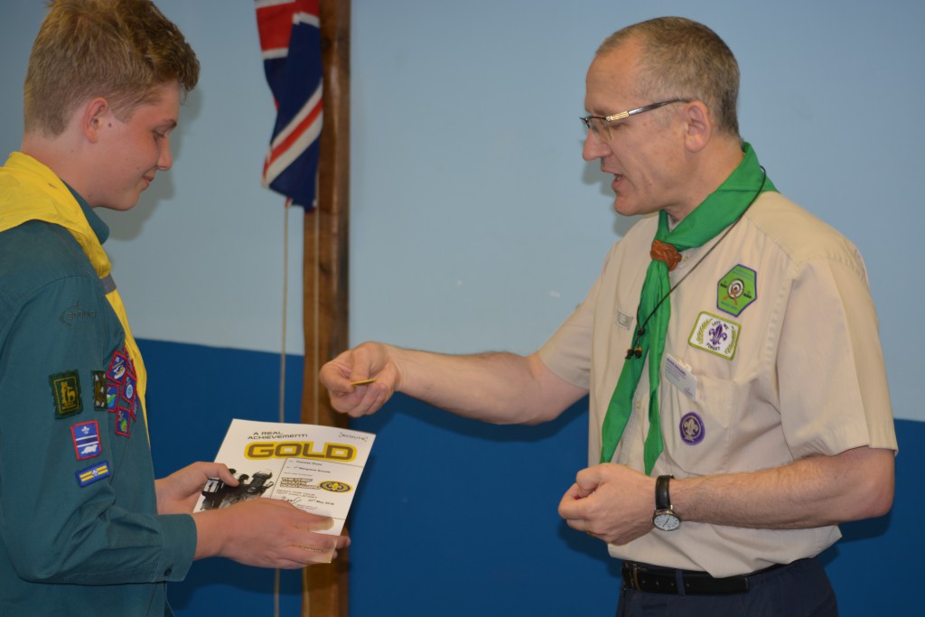 Thomas Hicks receiving his Chief Scout Award from Mark Ballard